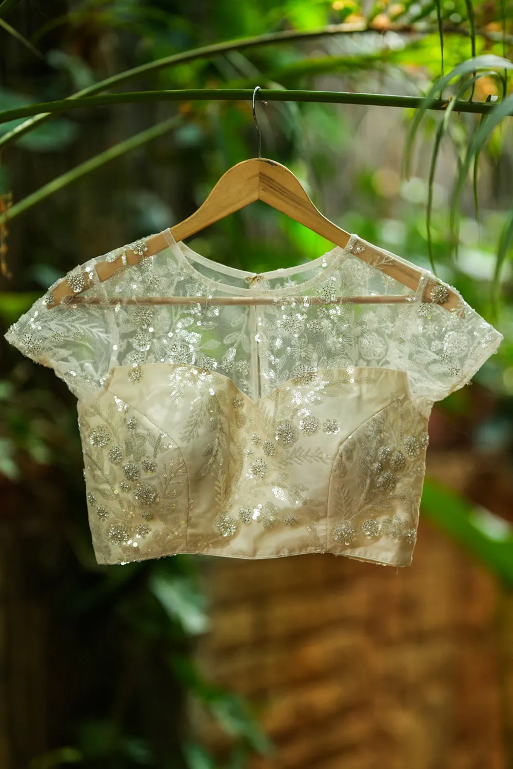 White Net Blouse with Sheer Yoke and ShimmeringFloral Design Sequins